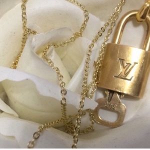 Louis Vuitton lock & key with gold necklace